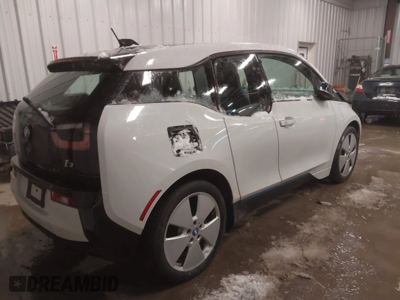 2015 BMW i3 z VIN WBY1Z4C53FV504836, wystawiony jako IAAI lot #41155614 z przebiegiem 66 910 mil mil oraz . Historia ofert i sprzedaży dostępna na DreamBid. Obrazek 4.