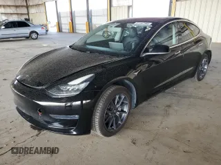 2018 Tesla Model 3 Long Range Battery with VIN 5YJ3E1EA6JF011383, listed as a Copart auction lot 51147185 with 148,507 mi miles and Clean Title. Bid and sale history available at carsss.com. Image 1.
