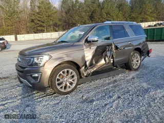 2019 Ford Expedition Platinum with VIN 1FMJU1LTXKEA56503, listed as a Copart auction lot 45657785 with 104,839 mi miles and Salvage Title. Bid and sale history available at carsss.com. Image 1.