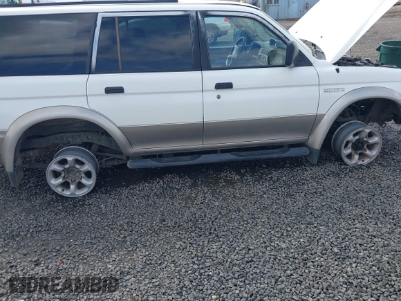 1998 Mitsubishi Montero LS z VIN JA4MT31P3WP025054, wystawiony jako IAAI lot #41880704 z przebiegiem 381 966 mil mil oraz . Historia ofert i sprzedaży dostępna na DreamBid. Obrazek 6.