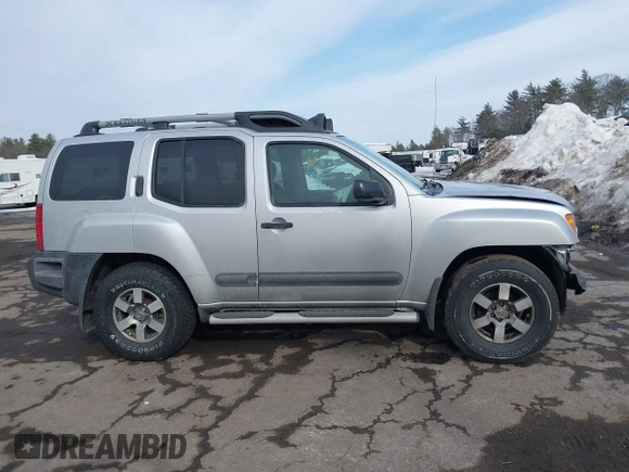 2012 Nissan Xterra S with VIN 5N1AN0NW6CC510015, listed as a IAAI auction lot 41614398 with 123,066 mi miles and . Bid and sale history available at DreamBid. Image 14.