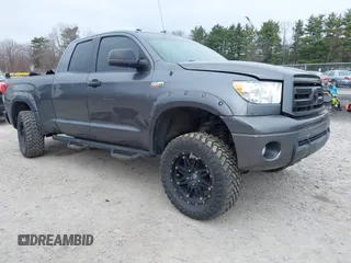 2012 Toyota Tundra z VIN 5TFUY5F13CX234233, wystawiony jako IAAI lot #41975274 z przebiegiem 141 220 mil mil oraz . Historia ofert i sprzedaży dostępna na DreamBid. Obrazek 1.