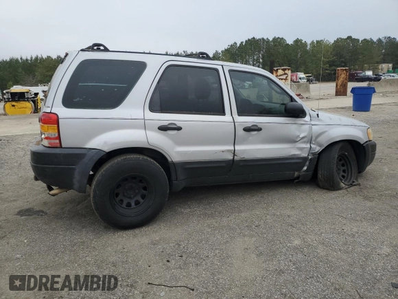 2003 Ford Escape XLS Popular with VIN 1FMYU02173KB43156, listed as a Copart auction lot 51534495 with 266,600 mi miles and Salvage title. Bid and sale history available at DreamBid. Image 3.