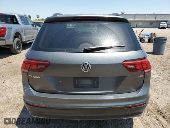 2018 Volkswagen Tiguan S z VIN 3VV1B7AXXJM109293, wystawiony jako Copart lot #55802845 z przebiegiem 49 821 mil mil oraz Szkoda całkowita • Salvage title. Historia ofert i sprzedaży dostępna na DreamBid. Obrazek 6.