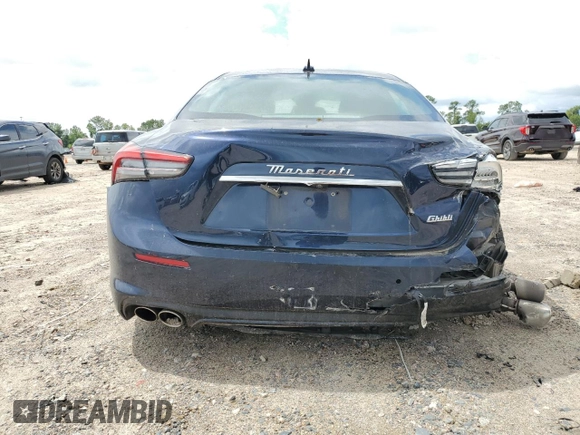 2022 Maserati Ghibli with VIN ZAM57XSA9NX391448, listed as a Copart auction lot 70404954 with 91,611 mi miles and Salvage Title. Bid and sale history available at carsss.com. Image 6.