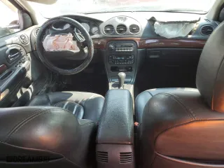 2002 Chrysler 300M with VIN 2C3HE66G22H159388, listed as a Copart auction lot 70599764 with 137,456 mi miles and Salvage Title. Bid and sale history available at carsss.com. Image 8.
