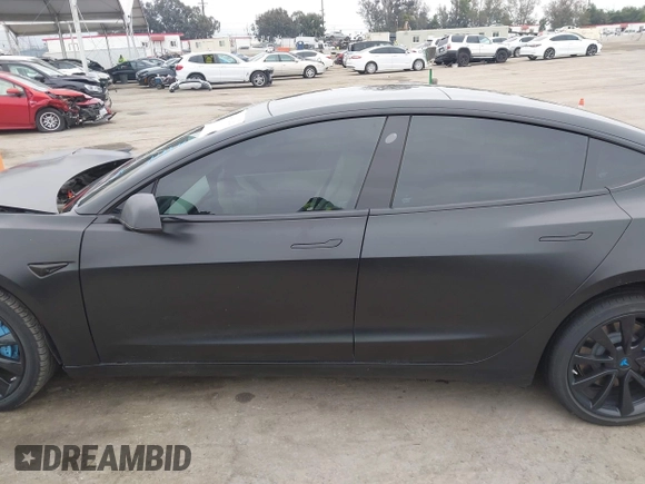2019 Tesla Model 3 Mid Range with VIN 5YJ3E1EA8KF538083, listed as a IAAI auction lot 41891458 with 46,958 mi miles and . Bid and sale history available at carsss.com. Image 14.