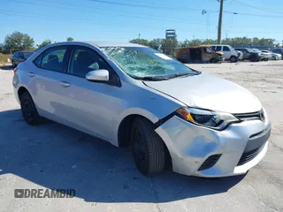 2014 Toyota Corolla L with VIN 2T1BURHE5EC006925, listed as a IAAI auction lot 40917569 with 130,761 mi miles and . Bid and sale history available at DreamBid. Image 1.