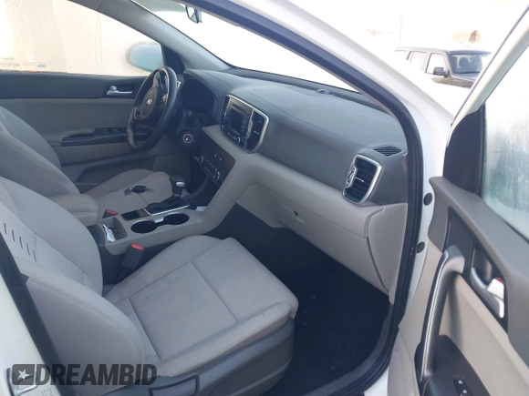2018 Kia Sportage LX z VIN KNDPMCAC3J7394485, wystawiony jako IAAI lot #41106807 z przebiegiem 104 865 mil mil oraz . Historia ofert i sprzedaży dostępna na DreamBid. Obrazek 5.
