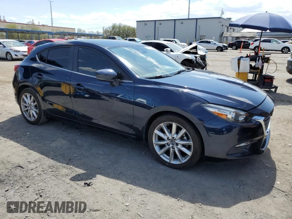 2017 Mazda 3 Touring with VIN 3MZBN1L71HM149340, listed as a Copart auction lot 60093215 with 71,060 mi miles and Salvage title. Bid and sale history available at DreamBid. Image 4.