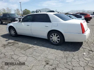 2006 Cadillac DTS 1SB z VIN 1G6KD57Y36U144765, wystawiony jako Copart lot #50603475 z przebiegiem 105 637 mil mil oraz Czysty tytuł • Clean title. Historia ofert i sprzedaży dostępna na DreamBid. Obrazek 2.