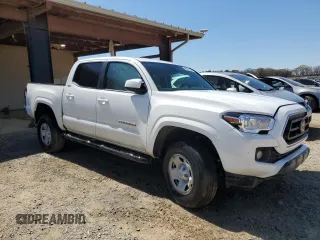 2022 Toyota Tacoma SR with VIN 3TYAX5GN9NT051570, listed as a Copart auction lot 49678735 with 52,709 mi miles and Salvage title. Bid and sale history available at DreamBid. Image 4.