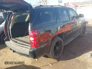 2008 Chevrolet Tahoe 3LT with VIN 1GNFC13J68R156148, listed as a IAAI auction lot 41607340 with 154,533 mi miles and . Bid and sale history available at DreamBid. Image 4.