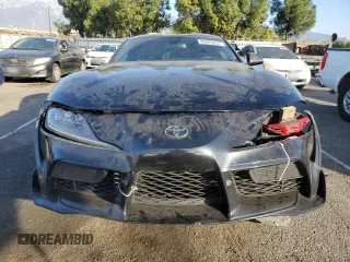 2022 Toyota GR Supra 3.0 with VIN WZ1DB0C04NW052244, listed as a Copart auction lot 82870654 with 63,592 mi miles and Salvage Title. Bid and sale history available at carsss.com. Image 5.