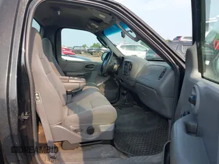 2003 Ford F-150 XL with VIN 2FTRF18243CB08751, listed as a IAAI auction lot 42456956 with 130,805 mi miles and . Bid and sale history available at DreamBid. Image 5.