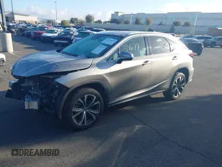2022 Lexus RX 450h с VIN 2T2HGMDA0NC074486, выставлен на аукционе IAAI как лот 41434677 с пробегом 50 955 миль миль и . История ставок и продаж доступна на DreamBid. Изображение 2.