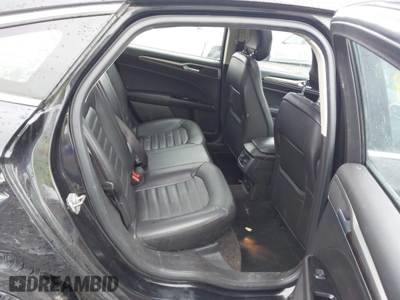 2014 Ford Fusion SE Hybrid with VIN 3FA6P0LU9ER310990, listed as a IAAI auction lot 42336303 with 197,588 mi miles and . Bid and sale history available at DreamBid. Image 8.