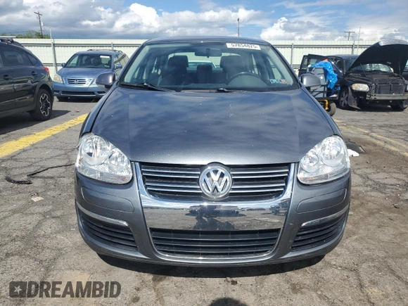 2009 Volkswagen Jetta SE with VIN 3VWRZ71K79M168084, listed as a Copart auction lot 57854825 with 150,986 mi miles and Salvage title. Bid and sale history available at DreamBid. Image 5.