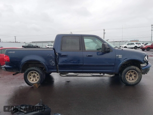 2003 Ford F-150 XLT with VIN 1FTRW08L33KC62060, listed as a IAAI auction lot 41618936 with 276,251 mi miles. Bid and sale history available at carsss.com. Image 13.