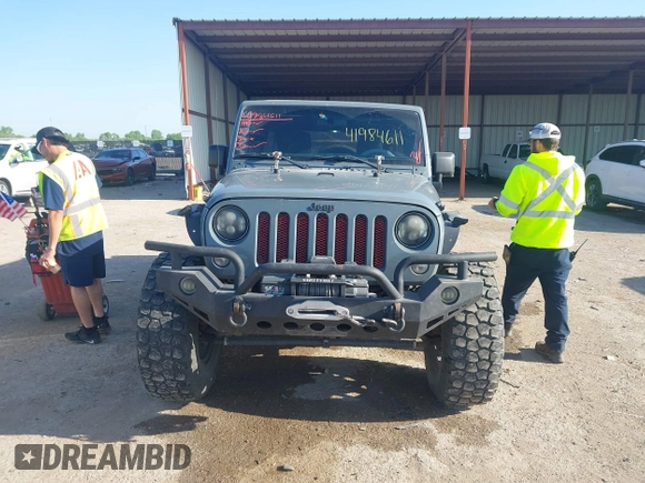 2015 Jeep Wrangler Unlimited Sport с VIN 1C4BJWDG6FL774275, выставлен на аукционе IAAI как лот 41984611 с пробегом 113 726 миль миль и . История ставок и продаж доступна на DreamBid. Изображение 12.