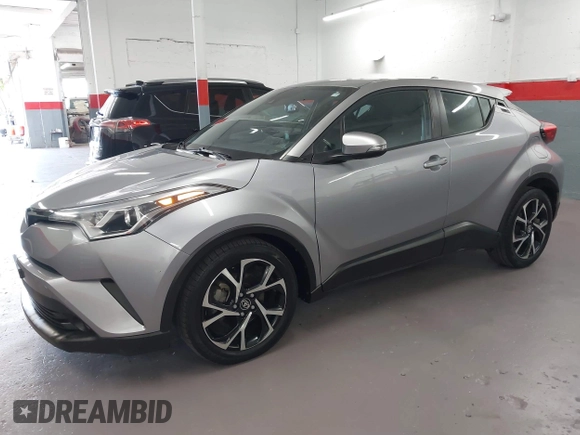 2018 Toyota C-HR XLE z VIN NMTKHMBX0JR015680, wystawiony jako IAAI lot #41987642 z przebiegiem 80 367 mil mil oraz . Historia ofert i sprzedaży dostępna na DreamBid. Obrazek 6.