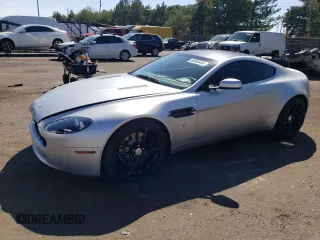 2006 Aston Martin Vantage z VIN SCFBB03B76GC02094, wystawiony jako Copart lot #69683434 z przebiegiem 26 353 mil mil oraz Szkody całkowita. Historia ofert i sprzedaży dostępna na DreamBid. Obrazek 1.