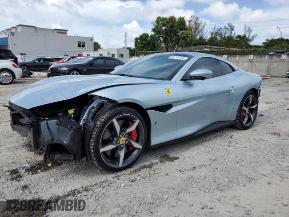 2023 Ferrari Portofino z VIN ZFF02RPA4P0298111, wystawiony jako Copart lot #65799704 z przebiegiem 1096 mil mil oraz Nie do naprawy. Historia ofert i sprzedaży dostępna na DreamBid. Obrazek 1.