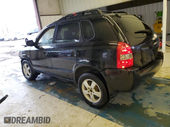 2005 Hyundai Tucson GL with VIN KM8JM12BX5U205060, listed as a Copart auction lot 71282644 with 243,076 mi miles and Salvage Title. Bid and sale history available at carsss.com. Image 2.