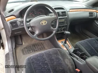 2002 Toyota Solara SE z VIN 2T1CE22P92C015724, wystawiony jako Copart lot #55807945 z przebiegiem 401 766 mil mil oraz Szkoda całkowita • Salvage title. Historia ofert i sprzedaży dostępna na DreamBid. Obrazek 8.