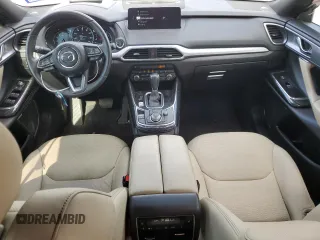 2021 Mazda CX-9 Grand Touring with VIN JM3TCADY2M0519977, listed as a Copart auction lot 76137724 with 31,306 mi miles and Salvage title. Bid and sale history available at DreamBid. Image 8.
