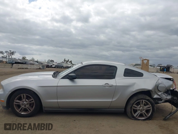 2010 Ford Mustang V6 with VIN 1ZVBP8AN1A5104611, listed as a IAAI auction lot 42062133 with 149,503 mi miles and . Bid and sale history available at DreamBid. Image 14.