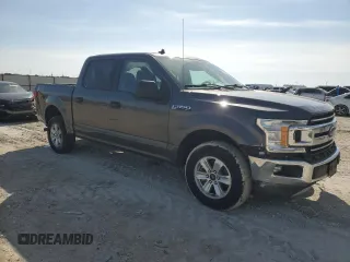 2020 Ford F-150 XL with VIN 1FTEW1C4XLFA23862, listed as a Copart auction lot 45156215 with 104,872 mi miles and Salvage Title. Bid and sale history available at carsss.com. Image 4.