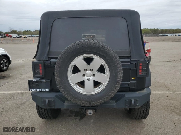 2011 Jeep Wrangler Unlimited Sahara with VIN 1J4HA5H14BL507148, listed as a Copart auction lot 52480325 with 233,835 mi miles and Clean Title. Bid and sale history available at carsss.com. Image 6.