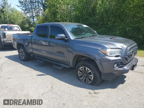 2020 Toyota Tacoma SR5 with VIN 3TMDZ5BN9LM097228, listed as a Copart auction lot 58164425 with Not provided miles and Salvage title. Bid and sale history available at DreamBid. Image 4.