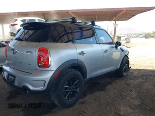 2014 MINI Countryman S with VIN WMWZC3C56EWP27328, listed as a IAAI auction lot 42187458 with 140,616 mi miles and . Bid and sale history available at DreamBid. Image 4.