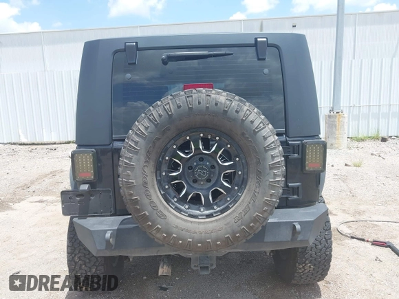 2008 Jeep Wrangler Unlimited X z VIN 1J4GA39148L560004, wystawiony jako IAAI lot #42523657 z przebiegiem 116 619 mil mil oraz . Historia ofert i sprzedaży dostępna na DreamBid. Obrazek 16.