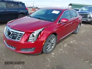 2013 Cadillac XTS z VIN 2G61N5S37D9177217, wystawiony jako IAAI lot #41747566 z przebiegiem 140 946 mil mil oraz . Historia ofert i sprzedaży dostępna na DreamBid. Obrazek 17.