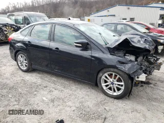 2015 Ford Focus SE with VIN 1FADP3F23FL227610, listed as a Copart auction lot 48946215 with Not provided miles and Salvage title. Bid and sale history available at DreamBid. Image 4.