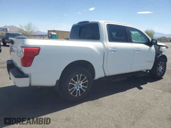 2021 Nissan Titan Pro-4X z VIN 1N6AA1ED5MN501877, wystawiony jako Copart lot #63714005 z przebiegiem 21 821 mil mil oraz Szkoda całkowita • Salvage title. Historia ofert i sprzedaży dostępna na DreamBid. Obrazek 3.