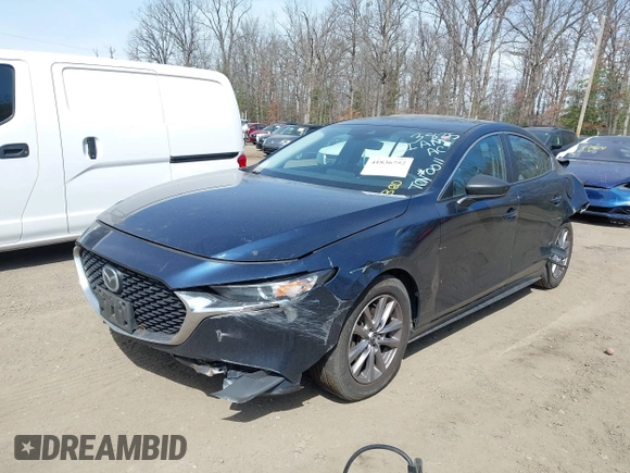 2021 Mazda 3 S with VIN 3MZBPAAL2MM253405, listed as a IAAI auction lot 41836752 with 63 mi miles and . Bid and sale history available at DreamBid. Image 2.