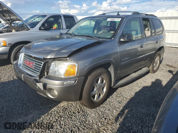 2006 GMC Envoy SLT with VIN 1GKDT13S662344414, listed as a Copart auction lot 73866114 with Not Provided miles and Salvage Title. Bid and sale history available at carsss.com. Image 1.