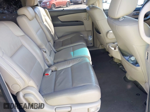 2012 Honda Odyssey EX-L with VIN 5FNRL5H63CB016526, listed as a IAAI auction lot 41701396 with 132,016 mi miles and . Bid and sale history available at carsss.com. Image 8.