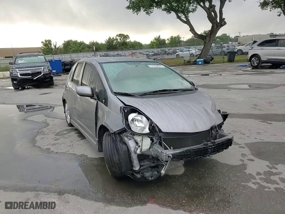2009 Honda Fit Sport with VIN JHMGE88499S002965, listed as a Copart auction lot 51354615 with 71,129 mi miles and Salvage Title. Bid and sale history available at carsss.com. Image 10.