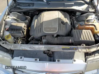 2006 Chrysler 300 C with VIN 2C3KK63H46H296625, listed as a Copart auction lot 70220974 with 104,811 mi miles and Salvage Title. Bid and sale history available at carsss.com. Image 11.