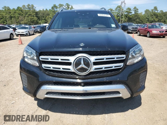 2018 Mercedes-Benz GLS with VIN 4JGDF6EE1JB084032, listed as a Copart auction lot 68464143 with 99,904 mi miles. Bid and sale history available at carsss.com. Image 5.