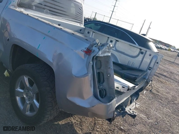 2017 Chevrolet Silverado 1500 LT with VIN 3GCUKREC2HG392487, listed as a IAAI auction lot 41807394 with 113,041 mi miles. Bid and sale history available at carsss.com. Image 6.