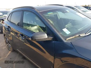 2018 Hyundai Kona Limited with VIN KM8K33A57JU072329, listed as a IAAI auction lot 41694616 with 107,801 mi miles. Bid and sale history available at carsss.com. Image 13.