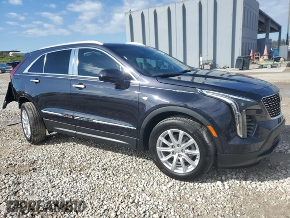 2023 Cadillac XT4 FWD Luxury with VIN 1GYAZAR4XPF104311, listed as a Copart auction lot 46891635 with 28,972 mi miles and Non repairable. Bid and sale history available at DreamBid. Image 4.