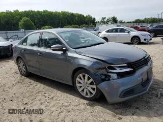 2014 Volkswagen Jetta SE with VIN 3VWD17AJ0EM246952, listed as a Copart auction lot 57507645 with 127,764 mi miles and Clean title. Bid and sale history available at DreamBid. Image 4.