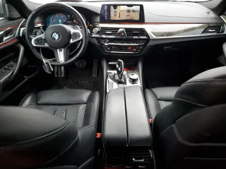 2018 BMW 5 Series M550i xDrive with VIN WBAJB9C56JB049524, listed as a Copart auction lot 43511805 with 55,759 mi miles and Salvage title. Bid and sale history available at DreamBid. Image 8.